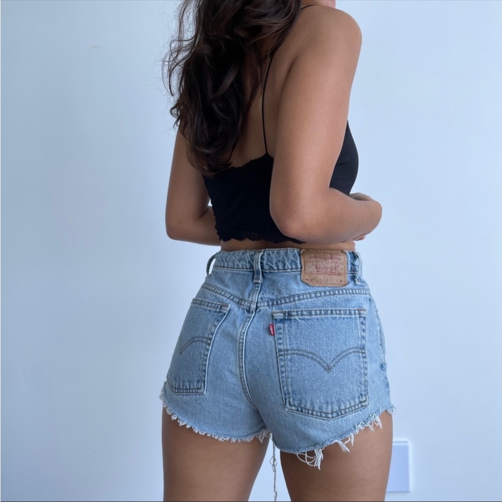 Vintage ‘90s Y2K Levi’s 512 high waisted cutoff jean shorts size 7